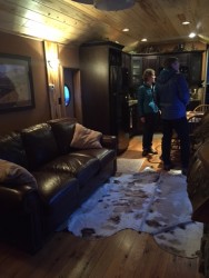 The living room in the luxury caboose. 