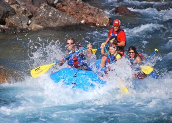 Navigating the rapids on the Middle Fork of the Flathead River. 