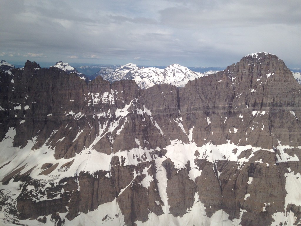 A bird's-eye view of the peaks of Glacier National Park in spring. 