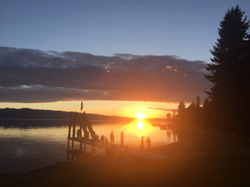 Sitting on the dock, watching the sunset. 