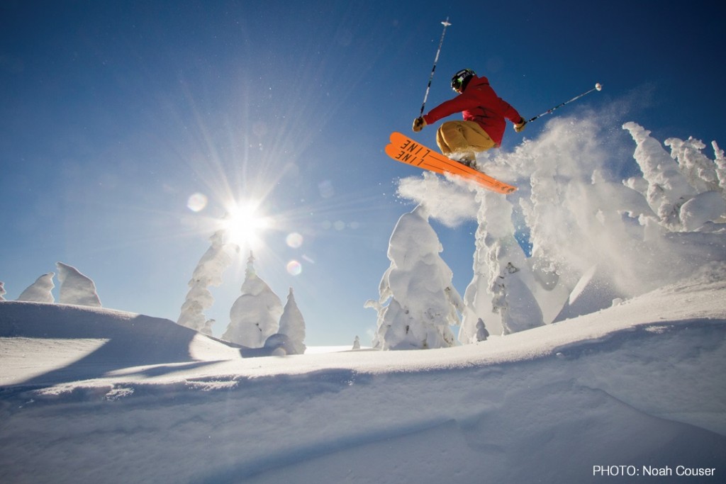 A skier catches air in Western Montana's Glacier Country. Photo: Noah Couser