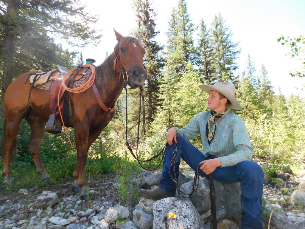 After chatting with Cinnamon along the river, we turned around and saw this scene. This was one of the favorite moments from my trip: just a cowboy hanging out, talking to his horse. 
