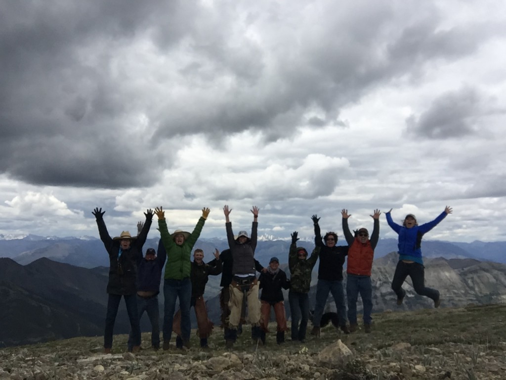 The crew standing on top of the world. 