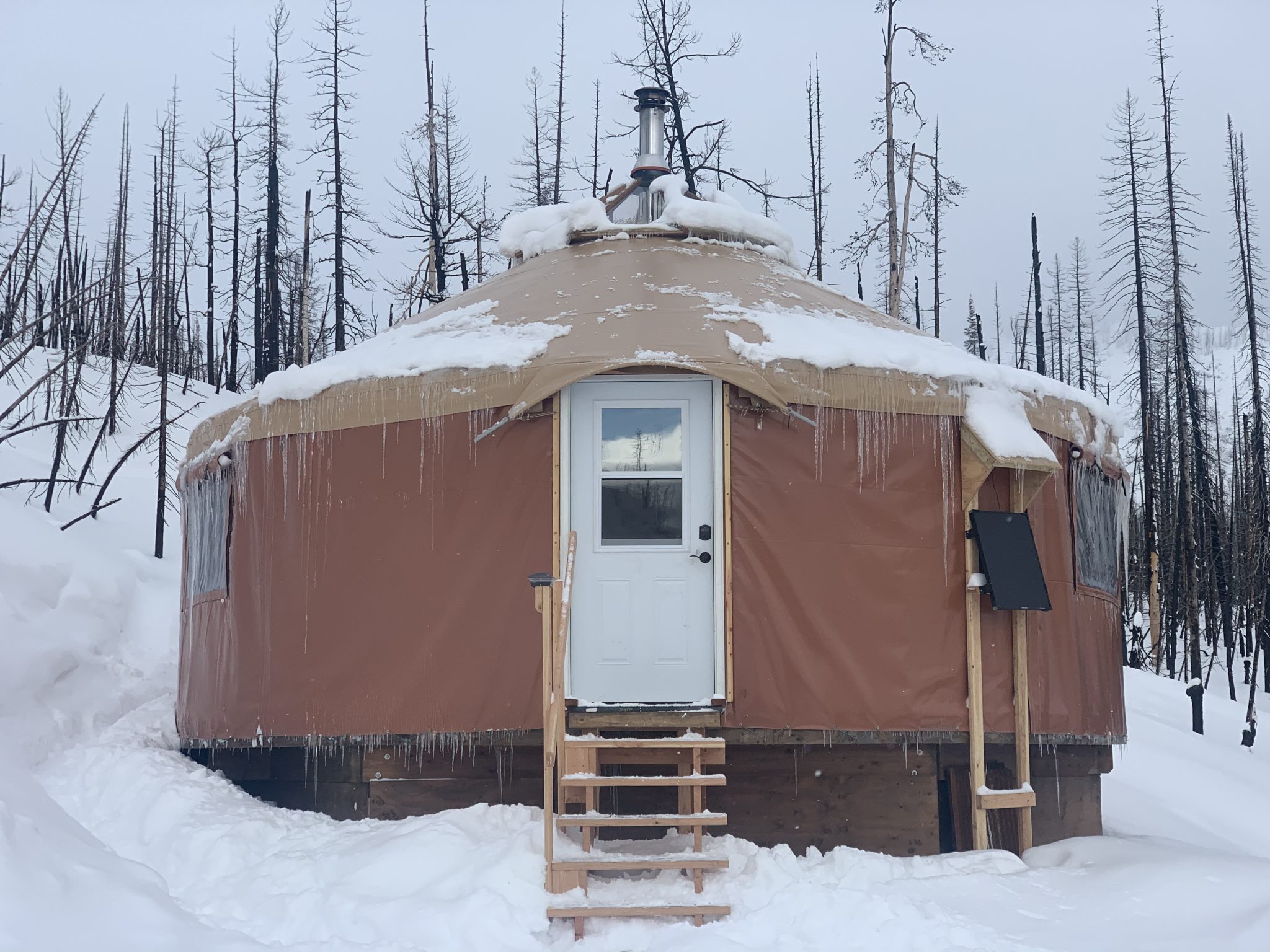 Embark on a Backcountry Ski + Yurt Experience in Western Montana The