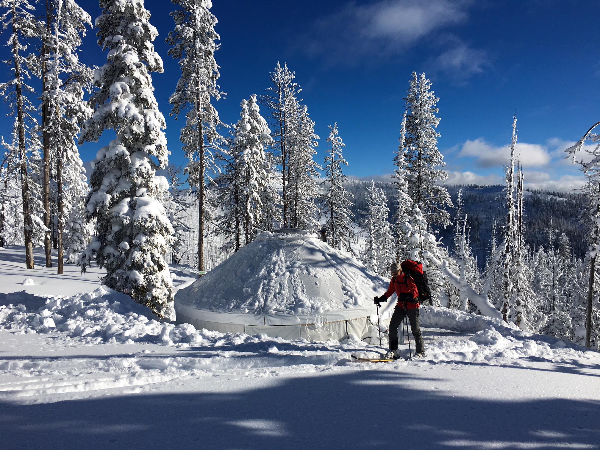 Embark on a Backcountry Ski + Yurt Experience in Western Montana